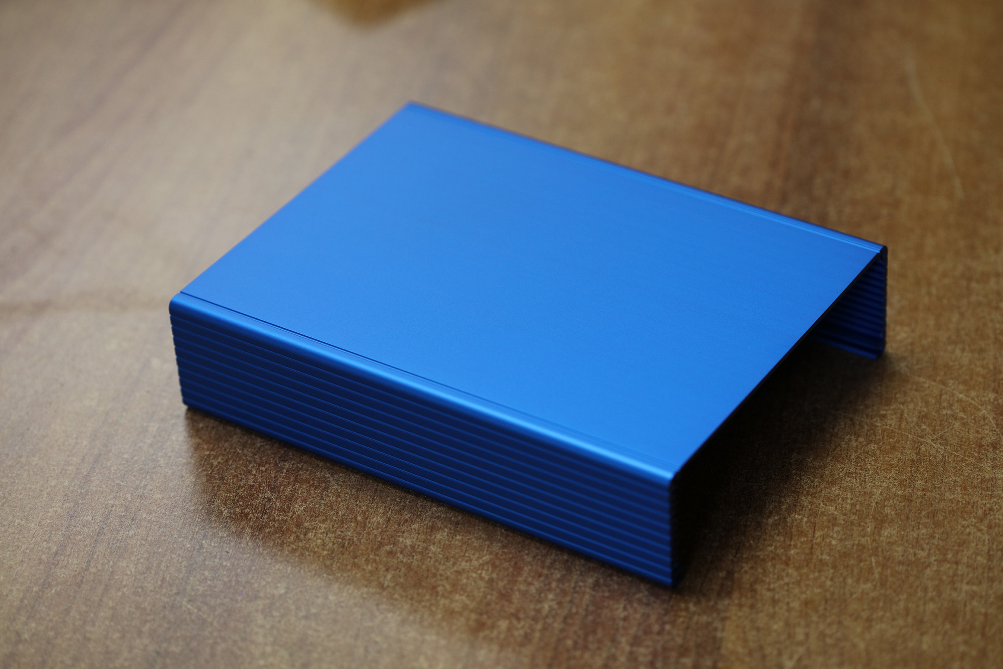 close up of an anodized product with a blue finish