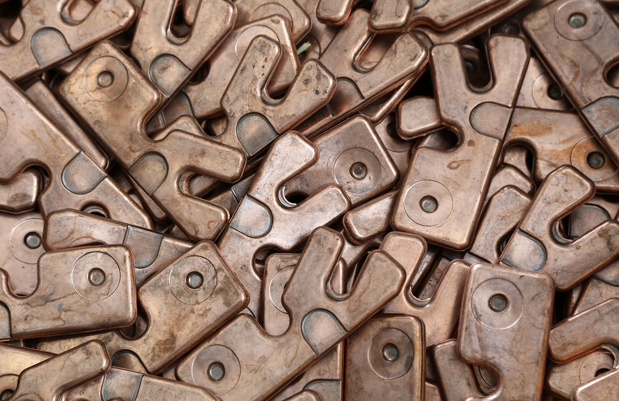 close up of a pile of copper components