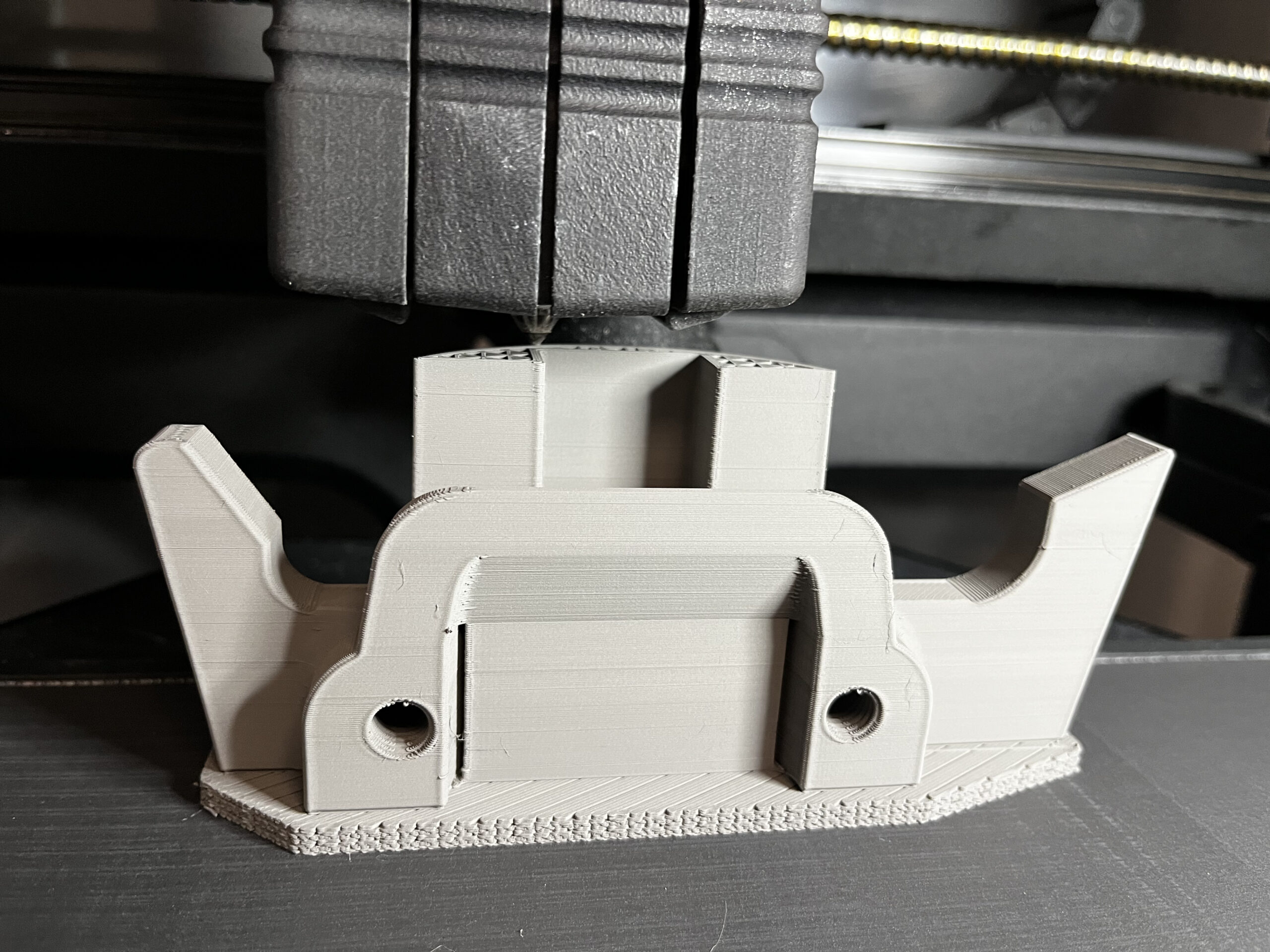 A 3D printer fabricating metal.